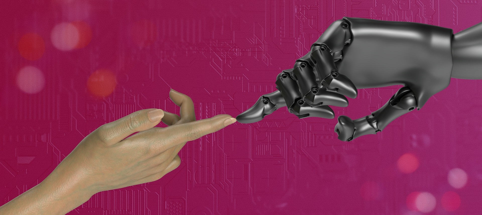 Human hand touching a robotic hand